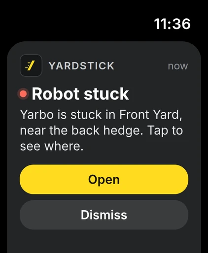 Apple Watch showing a Yardstick alert: the robot is stuck in the front yard