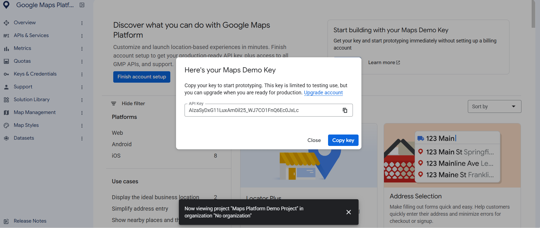 A Google Cloud dialog headed Here's your Maps Demo Key, with the key in a box, the words 'This key is limited to testing use, but you can upgrade when you are ready for production', and an Upgrade account link.