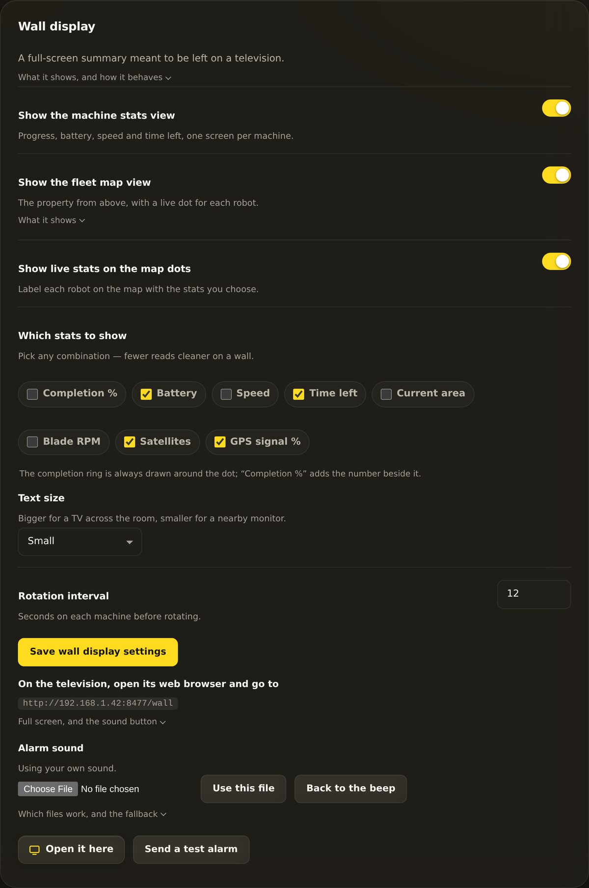 The Wall display settings panel: a Rotation interval field in seconds and controls for the alarm sound.